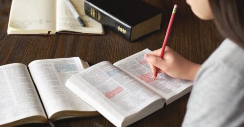 young women scriptures stuyding pencils